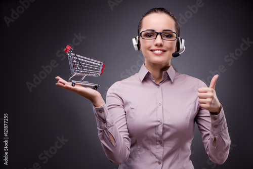 Young sales operator in telesales teleshopping concept