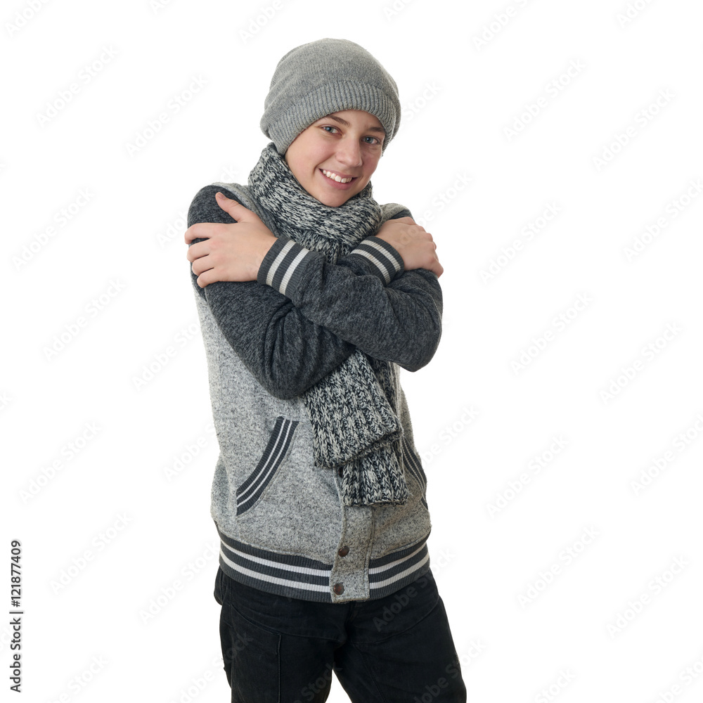 Cute teenager boy in gray sweater over white isolated background Cute teenager boy in gray sweater over white isolated background