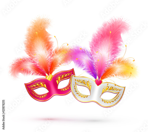 Pair of bright vector carnival masks with colorful feathers