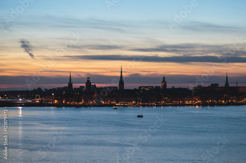 Beautiful super wide-angle panoramic aerial view of Stockholm, Sweden with harbor and skyline with scenery beyond the city, seen from the observation tower, sunny summer day with blue sky 