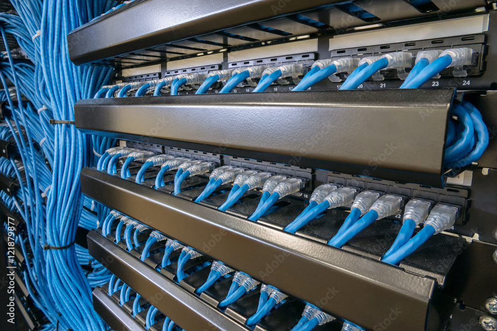 Ethernet cables and path panel in rack cabinet Stock Photo | Adobe Stock