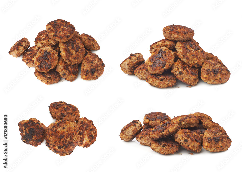 Pile of small hand made cutlets isolated over white background