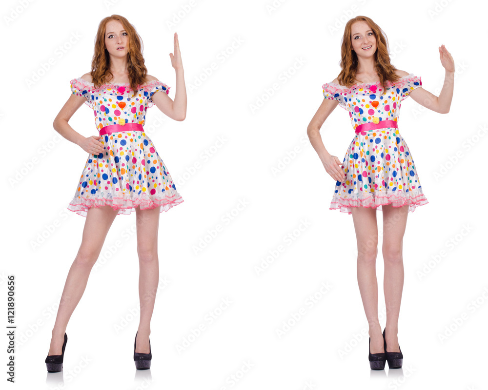 Young woman in polka dot dress isolated on white Young woman in polka dot dress isolated on white