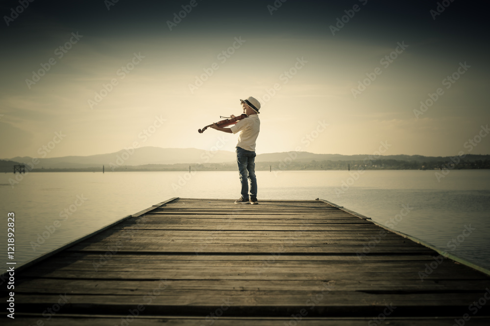 adorable boy playing the violin adorable boy playing the violin