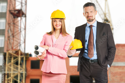 Two construction engineers ...
