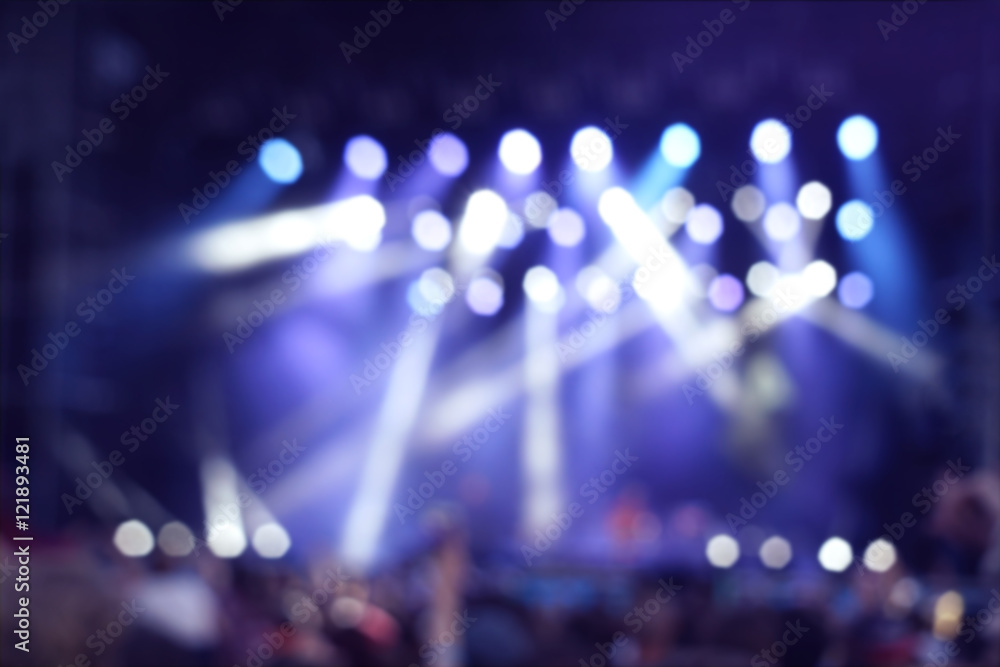 Blurred background of concert illuminations on stage