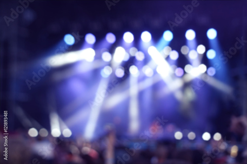 Blurred background of concert illuminations on stage