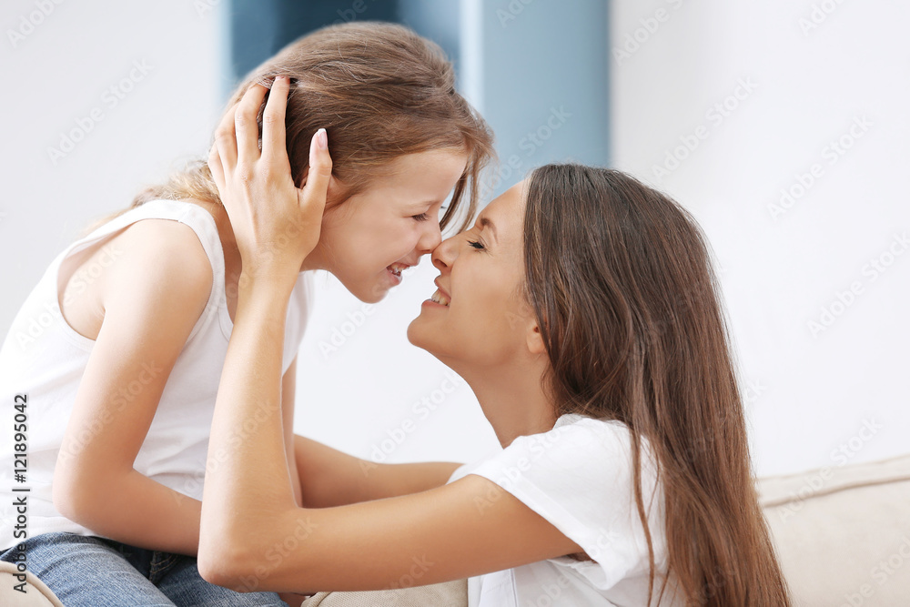 Cute girl with mother at home Cute girl with mother at home