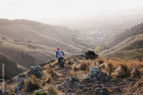 Mountain Biker Looking Out Over City
