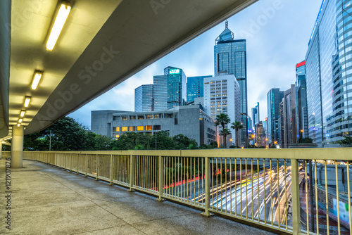 light trails through the footbridge,hongkong china.