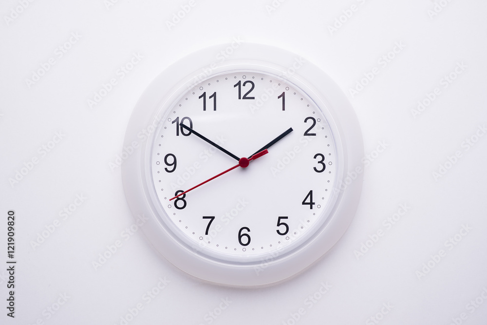 wall clock on the white background wall clock on the white background