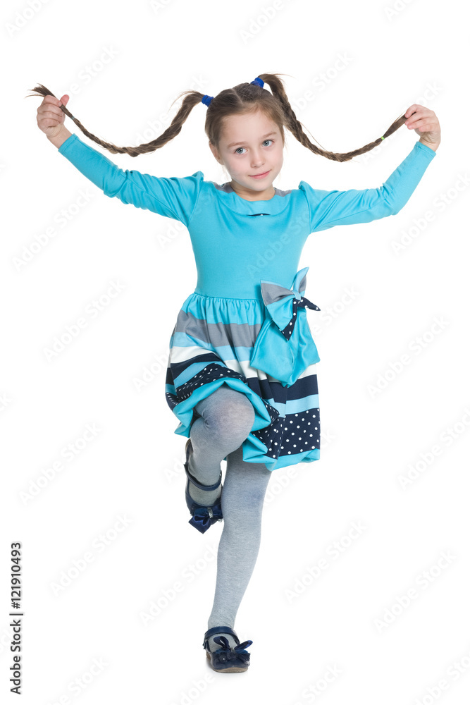 Active little girl with pigtails