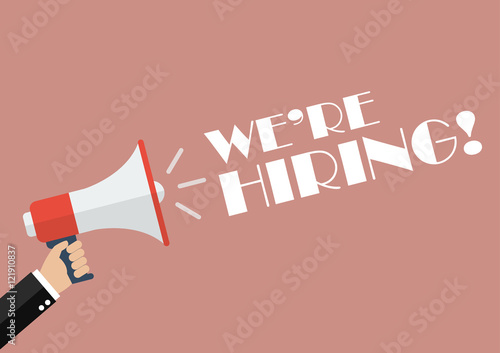 Hand holding megaphone with word We are hiring