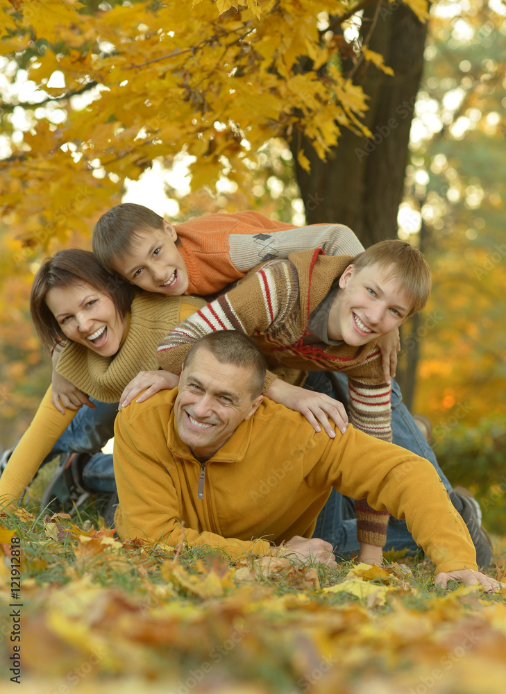 Happy family in autumn forest Happy family in autumn forest