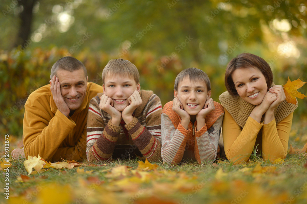 Fototapeta premium Happy family in autumn forest