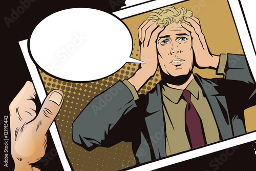 Hand with photo. Upset man clutching his head.