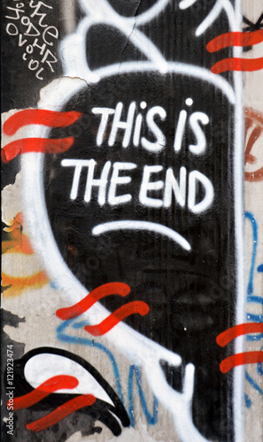 Graffiti, This is the End,  on disused shop door