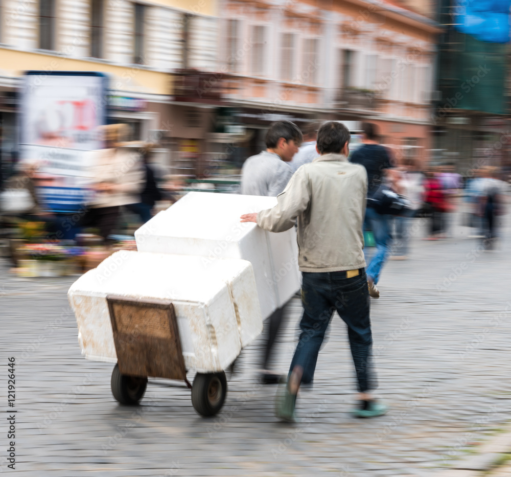Two men delivering goods Two men delivering goods