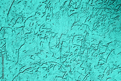 Texture of old vintage turquoise plaster wall