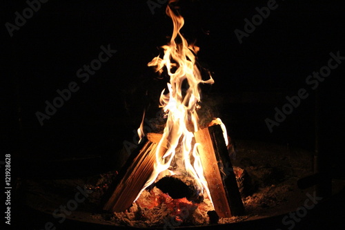 Bonfire in a camping place at the warm summer night