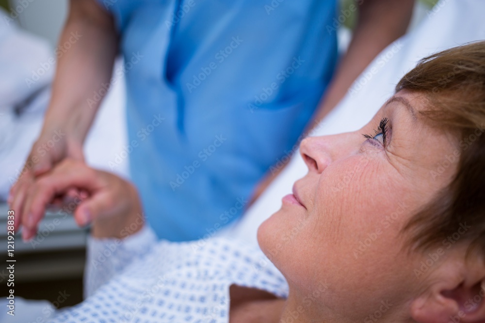 Senior patient talking to a nurse Senior patient talking to a nurse