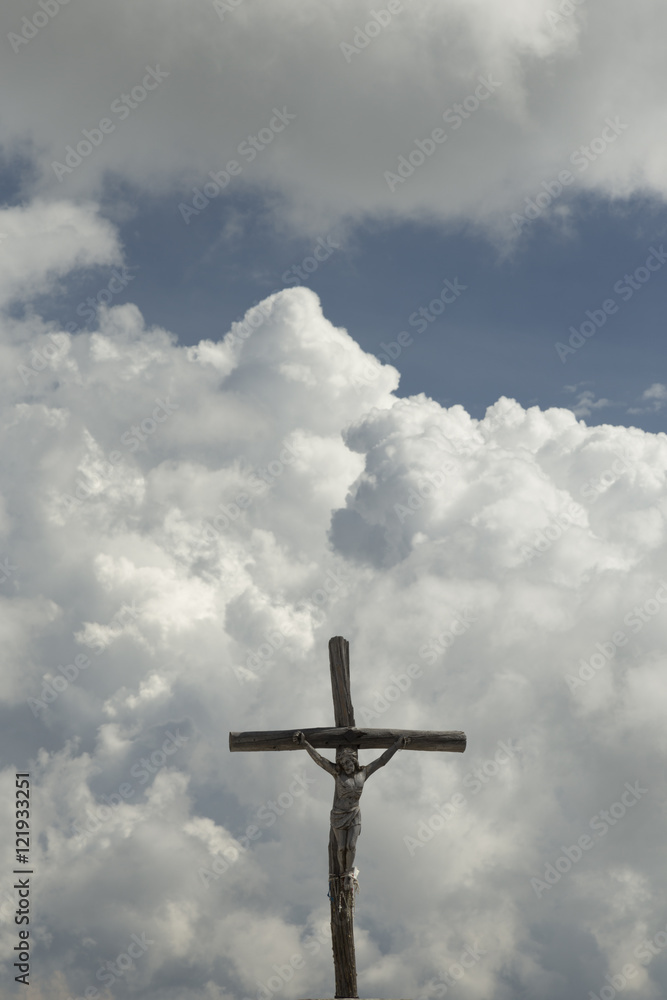 Religious cross in Heaven with clouds in the background