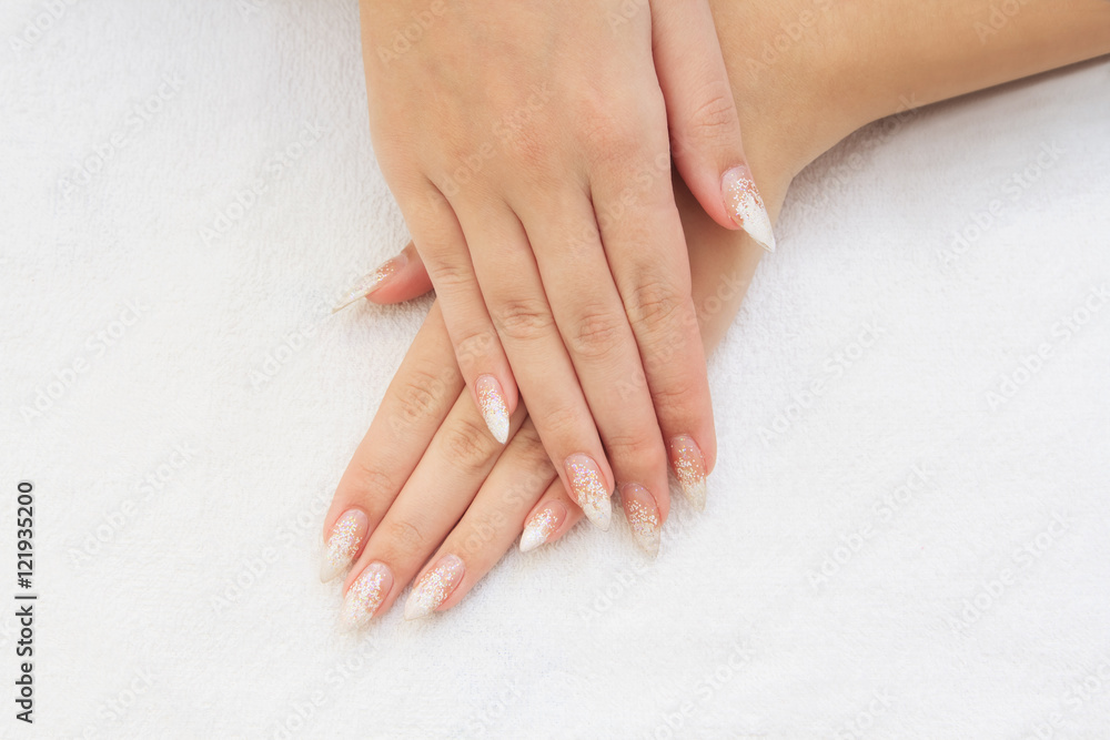 Beautiful female hands with french manicure Beautiful female hands with french manicure