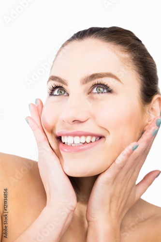 Beautiful woman posing against white background