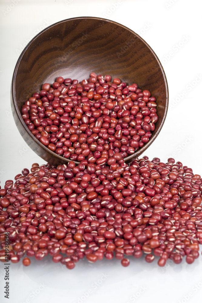 Red Beans in a wooden bowl on the white background Red Beans in a wooden bowl on the white background