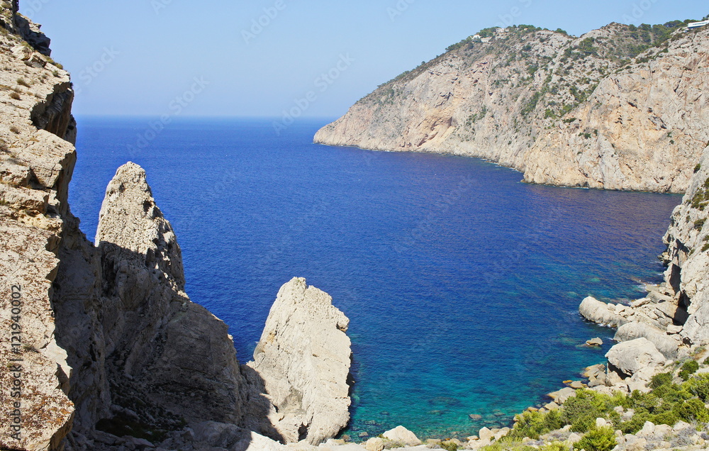 Coast of Ibiza, the sea and the rocks.