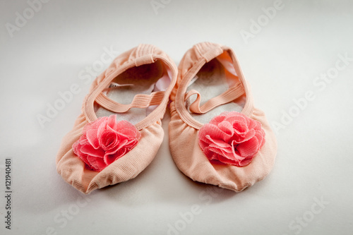 used ballet shoes on white backgrounds