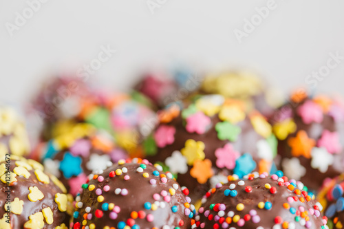 Delicious holiday colored cake pops in a glass