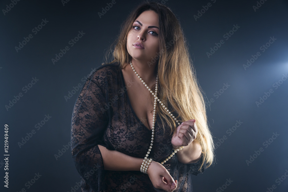 Young naked beautiful caucasian plus size model, xxl woman in black peignoir  on smoky background, beauty female nude body with big breast Stock Photo |  Adobe Stock