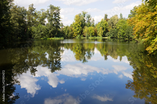 A scenic pond in the Arkadia park in Poland