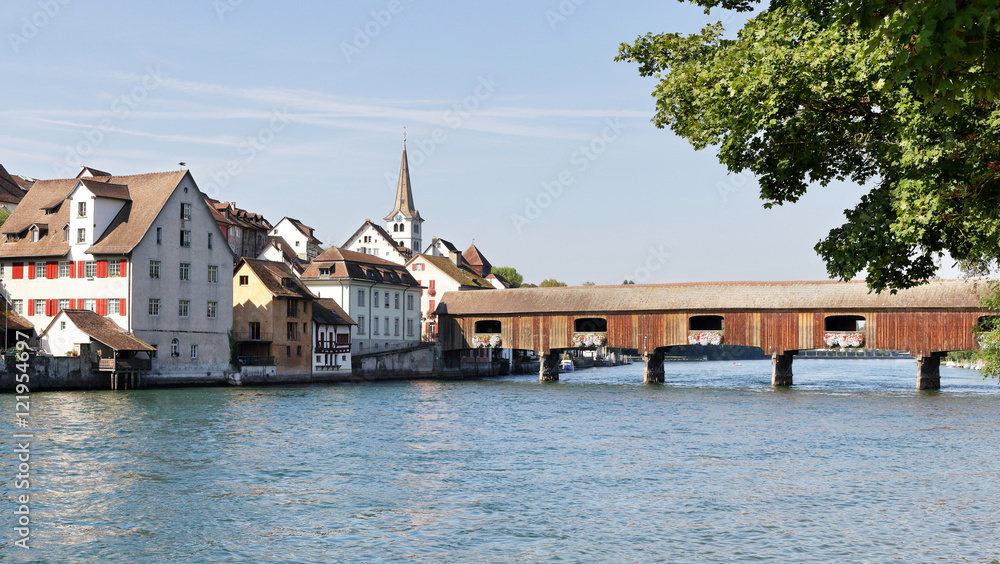 Wooden covered Bridge over the Rhine river at Diessenhofen, Switzerland Wooden covered Bridge over the Rhine river at Diessenhofen, Switzerland