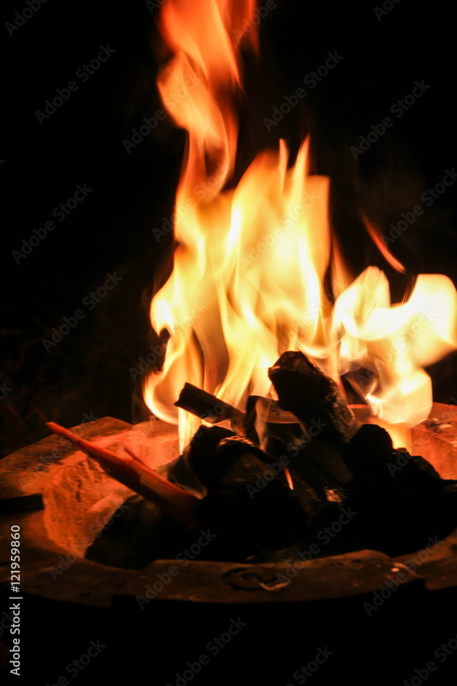 Flame in traditional fireplace kitchen in Thailand.