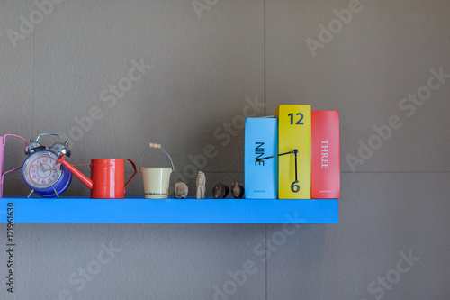 Wallpaper Mural book clock on gray background Torontodigital.ca