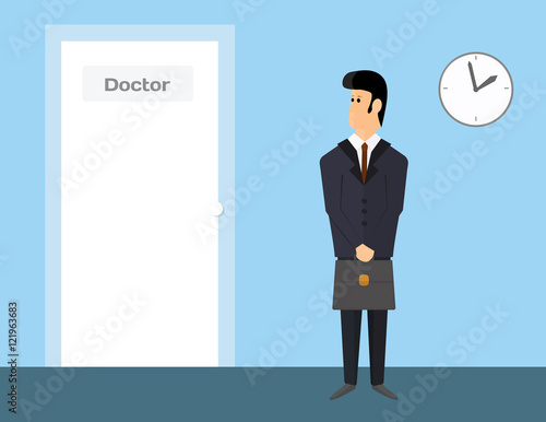 Pharmaceutical sales representative waiting to visit a doctor. Man in suit is waiting in doctor's door