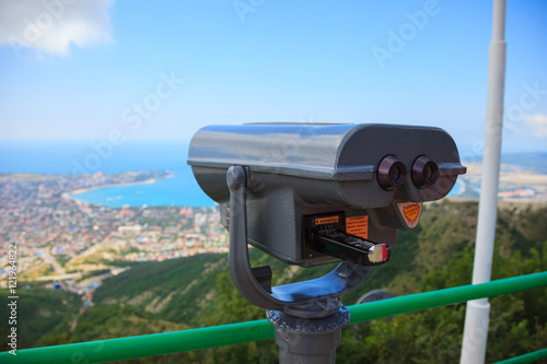 Binoculars on the background of the beautiful sea view