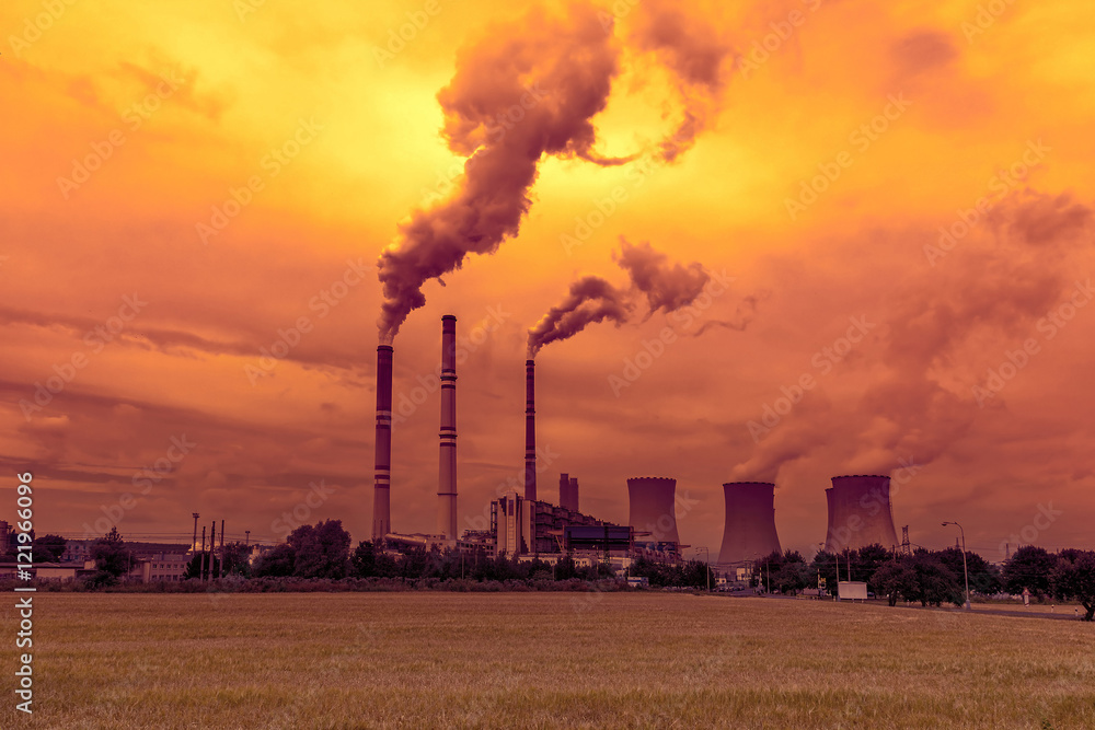 
Thermal power plant, sunset sky