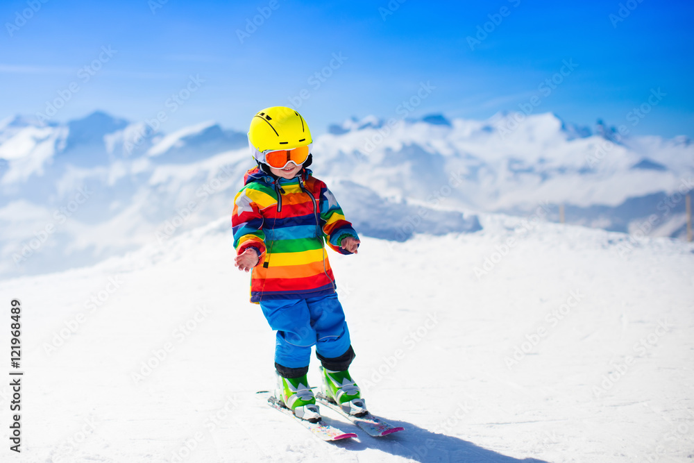 Little child skiing in the mountains Little child skiing in the mountains