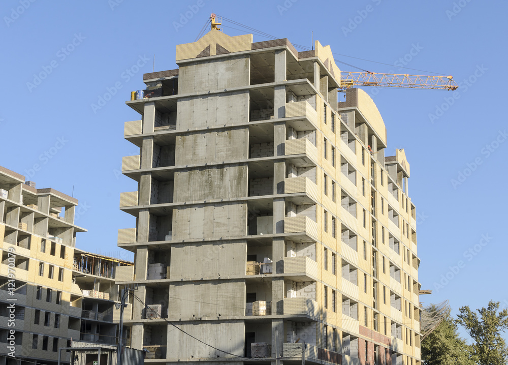 Fototapeta premium Grey cast-concrete house. Side view.