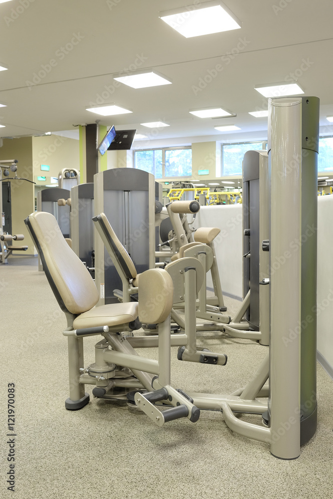Interior of a fitness hall with sport equipment Interior of a fitness hall with sport equipment
