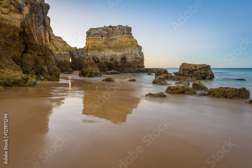 Early morning on the beach of Praia da Rocha, Portimao Coast. Algarve region. Portugal © alexanderkonsta