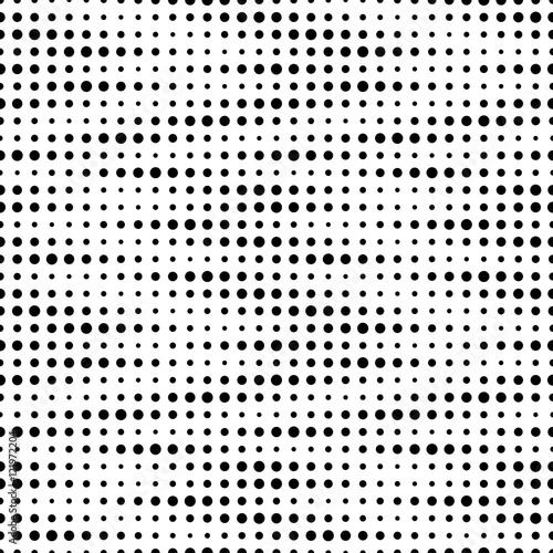 Vector seamless texture. Modern geometric background. Monochrome pattern of equally spaced circles of different sizes