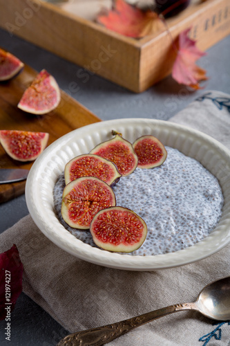 Chia seed pudding with figs in a bowl. Autumn healthy breakfast.