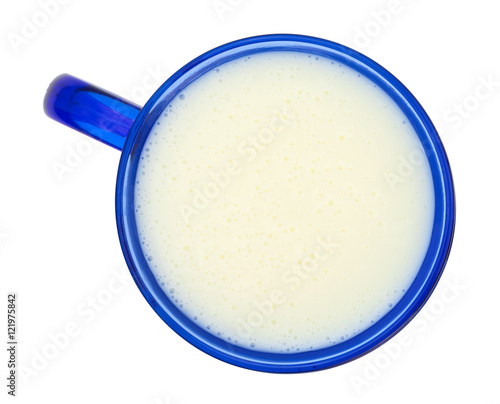 Mug of buttermilk on a white background