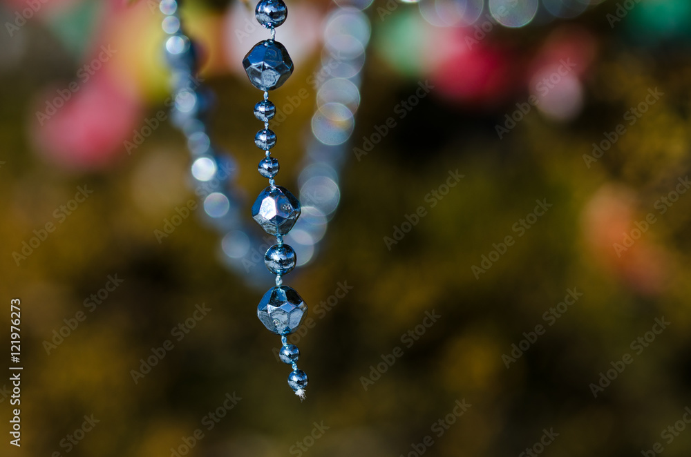 Blue Beads Strung on the Outdoor Christmas Tree Blue Beads Strung on the Outdoor Christmas Tree