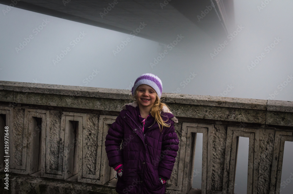 Fototapeta premium child by foggy bridge