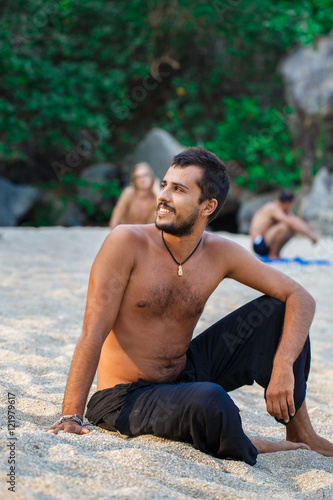 Man sitting on a beach